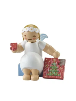 Wendt&Kühn Figuren>Margeritenengel, sitzend, mit Puzzle