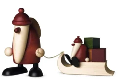 Köhler Kunsthandwerk Figuren>Weihnachtsman mit Geschenkeschlitten und Kind